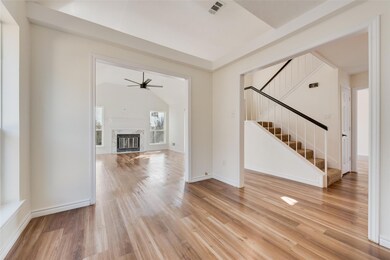 Unfurnished living room with light hardwood / wood
