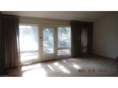 A wall of windows in the Living Room.
