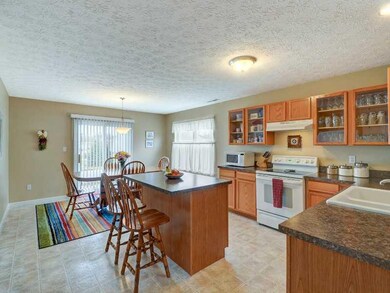 Kitchen. Kitchen with brand-new countertop and Center Island. View of Breakfast Rm.