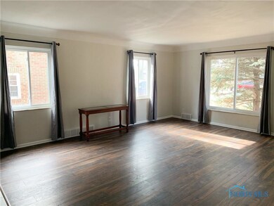 Spacious Living Room with New Floors