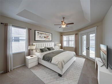 Main Bedroom with French doors to the pool