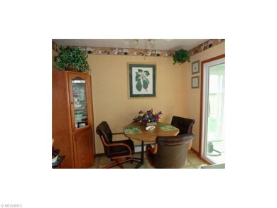 Eat-in area of the kitchen of 1305 that exits out 