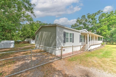 Left Side of home with gate to backyard!