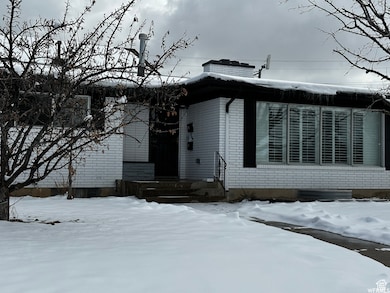 View of front of property featuring brick siding