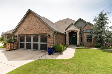 Beautifully landscaped with covered front porch an