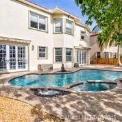 View of Pool and Spa looking back into the house. 