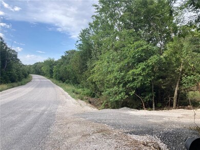 cleared entry into land - newly paved Malico Mt Rd
