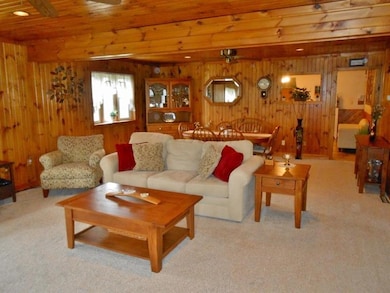 Living room open to formal dining room.