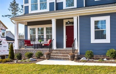 Front entrance to the home and view of the 19X4 front porch