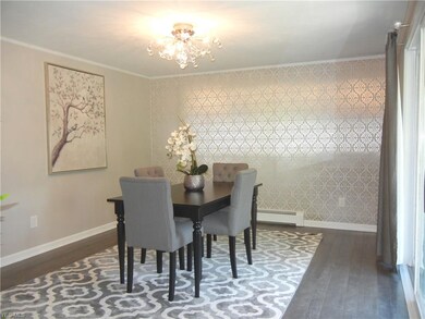 Formal dining room exits onto the deck with gorgeo