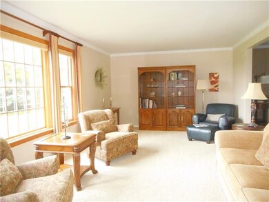 Spacious living room offers abundance of natural l
