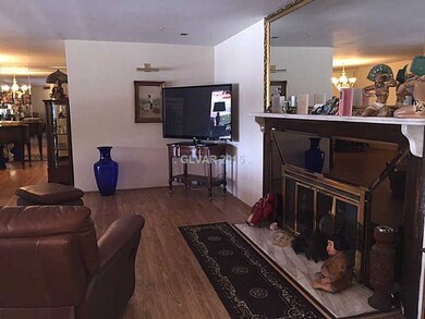 Property Photo. woodburning fireplace in living ro