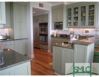 Kitchen. Kitchen is open to the living and dining 