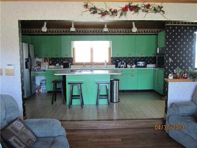 Kitchen. Kitchen with step down to...