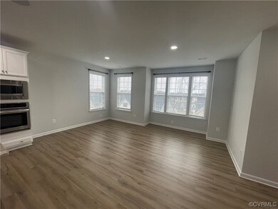 Living room featuring hardwood flooring