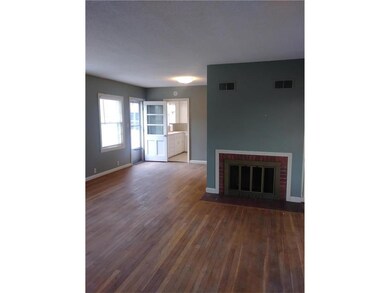 Living Room overlooking Dining Space & Backyard