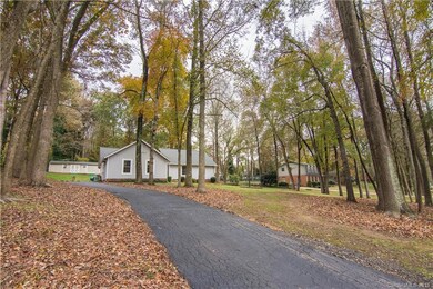 Home Sits Back of Lot - Oversized Wired Workshop in Background Also