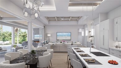 Kitchen with light wood-type flooring, coffered ce