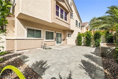 Fenced backyard with a patio
