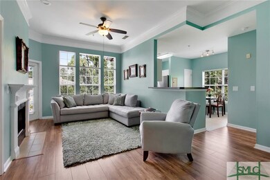 Spacious Living Room featuring wood flooring and L