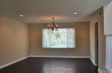 Recessed lighting and large windows.