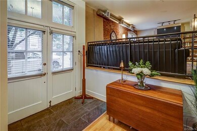 Foyer has 9'+ ceiling and is open to living area
