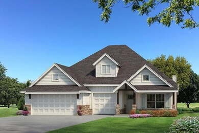 Craftsman inspired home featuring a garage and a f