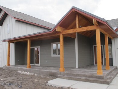 Large front porch with stamped concrete.