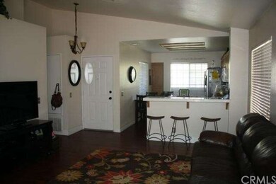 Beautiful dark flooring enhances living space.