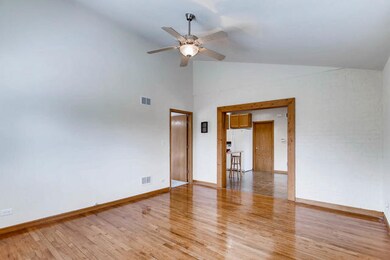Living Room w/Vaulted Ceiling and hardwood floors