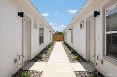 View of side of home with stucco siding