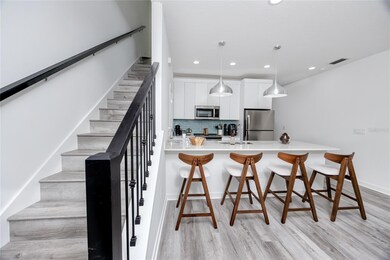 Photo is the finished product of another townhome project built by Gulf Bay Builder's. Photos are for illustrative purposes only.