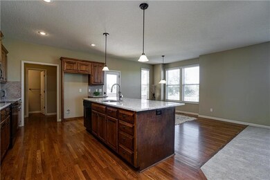 Well appointed kitchen with large island and granite counters!