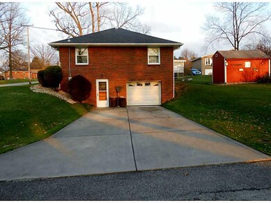 Exterior Front. Double concrete driveway