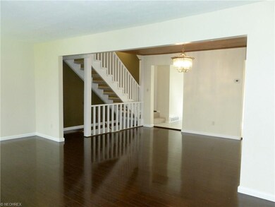 From the living room, a view of the dining room, f