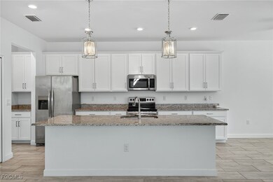 11484 Canopy Loop, Miromar Lakes, FL 33913 - photo 7