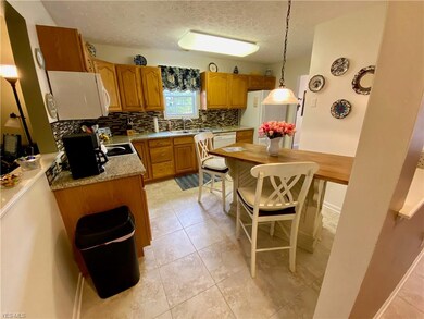 Upgraded Eat-in Kitchen with granite counter top a