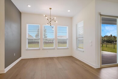 Unfurnished dining area featuring wood finished f