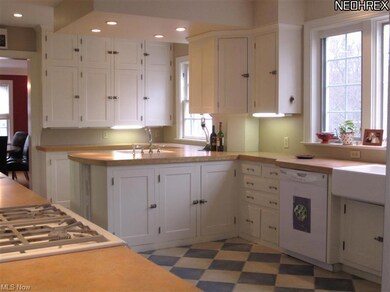 Kitchen with custom cabinets built to match the or