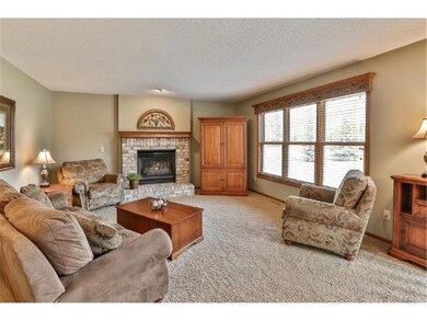 Great level family room with a cozy gas fireplace 