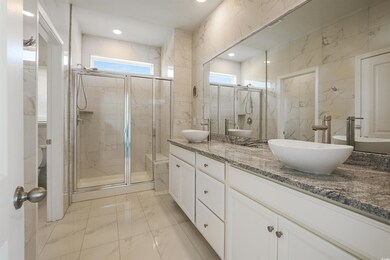 Bathroom with a wealth of natural light, double va