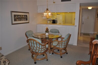 ANOTHER LOOK AT THE DINING AREA WITH THE KITCHEN A