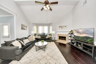 Open family room easily accommodates a wrap-around