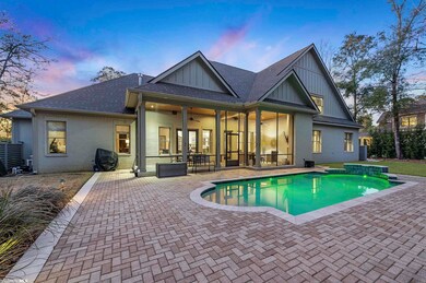 Pool and Screened Porch at Twilight