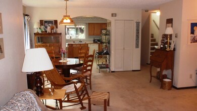 living area to the kitchen