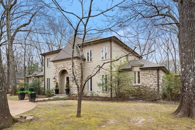 View of front facade featuring stone siding and a 