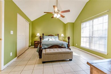 Master Bedroom with vaulted ceilings and easy to m