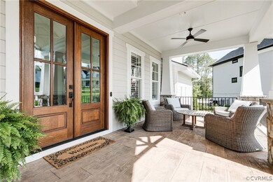 The full front concrete porch provides various sea