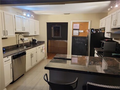 Kitchen, laundry on right
