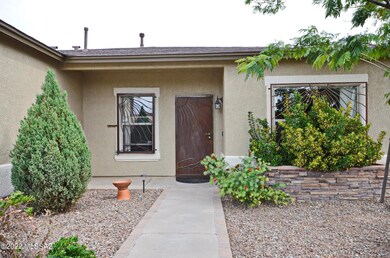 Front Entry with custom wrought iron